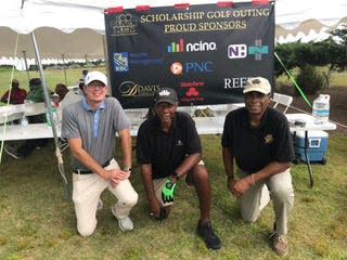 Members and supporters of 100 Black Men of Coastal North Carolina play in a fundraiser golf tournament. PHOTO COURTESY OF JERRY JACKSON