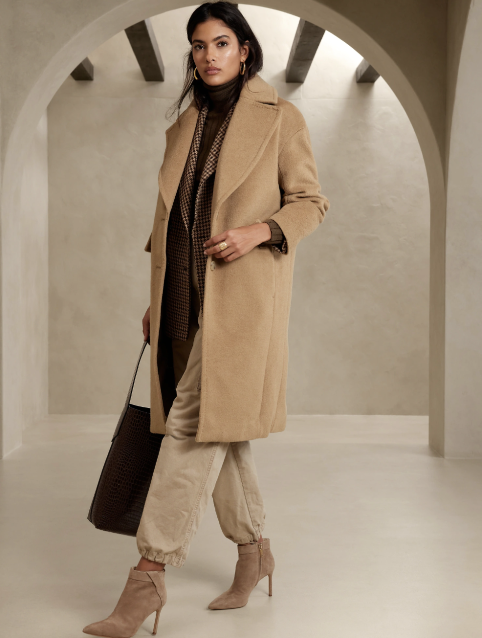 model wearing beige heels, beige pants and camel wool Sunday Coat (photo via Banana Republic)