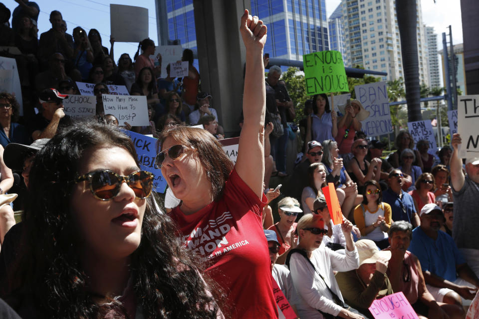 <p> Helena Moreno, center, yells during a protest against guns on the steps of the Broward County Federal courthouse in Fort Lauderdale, Fla., on Saturday, Feb. 17, 2018. Nikolas Cruz, a former student, is charged with killing 17 people at Marjory Stoneman Douglas High School in Parkland, Fla., on Wednesday. (AP Photo/Brynn Anderson) </p>