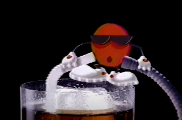 Animated character Cool Spot wearing sunglasses, floating with a drink