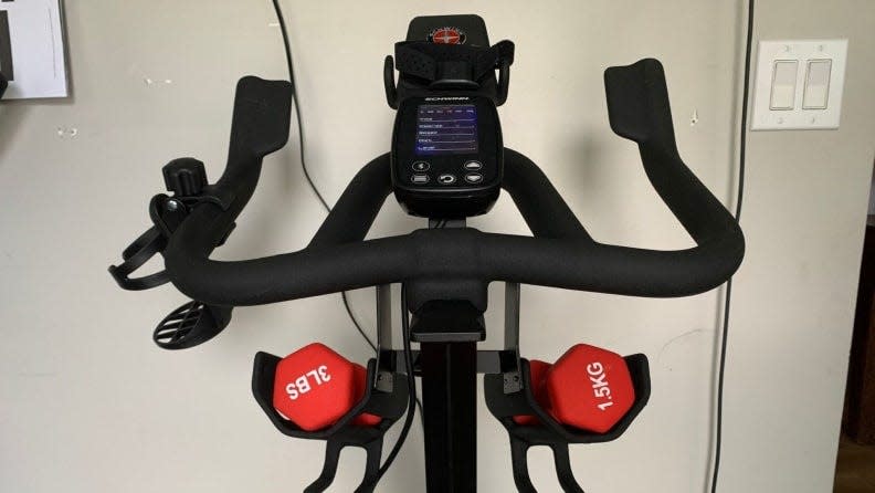 Schwinn's IC4 Indoor Cycling Bike comes with a Bluetooth-enabled heart rate tracker, a pair of three-pound weights, built-in media rack, and USB charging port.