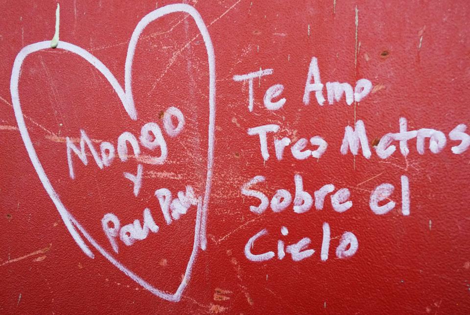 This Jan. 15, 2013 photo shows Spanish graffiti left by a worker on a steel column on the 104th floor of One World Trade Center in New York. Construction workers finishing New York's tallest building at the World Trade Center are leaving their personal marks on the concrete and steel in the form of graffiti. (AP Photo/Mark Lennihan)