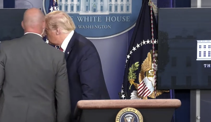 Donald Trump is taken away after an incident outside the White House. Source: News Corp