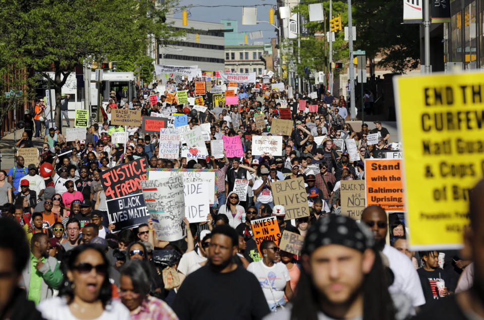 FILE - In this May 2, 2015, file photo, protesters march through Baltimore the day after charges were announced against the police officers involved in Freddie Gray's death. Black Lives Matter has gone mainstream — and black activists are carefully assessing how they should respond. Today, the movement boasts a following of millions across social media platforms. (AP Photo/Patrick Semansky, File)