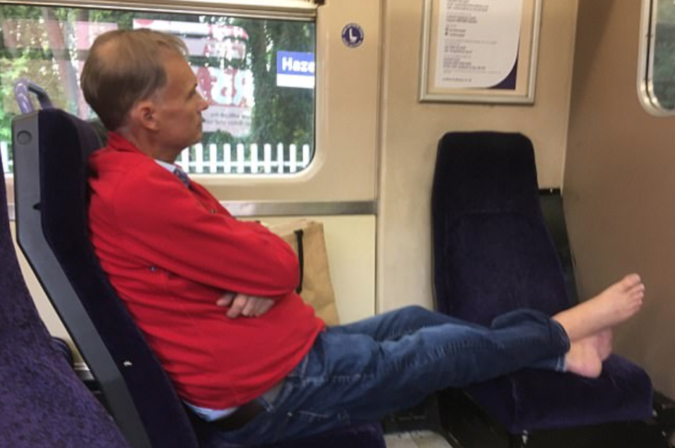 Another passenger was so angry that they took a picture of Andrew Dignan with his bare feet on a seat (Mercury)