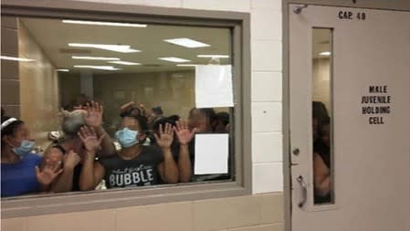 An overcrowded area holding women at a Border Patrol station is seen in Brownsville