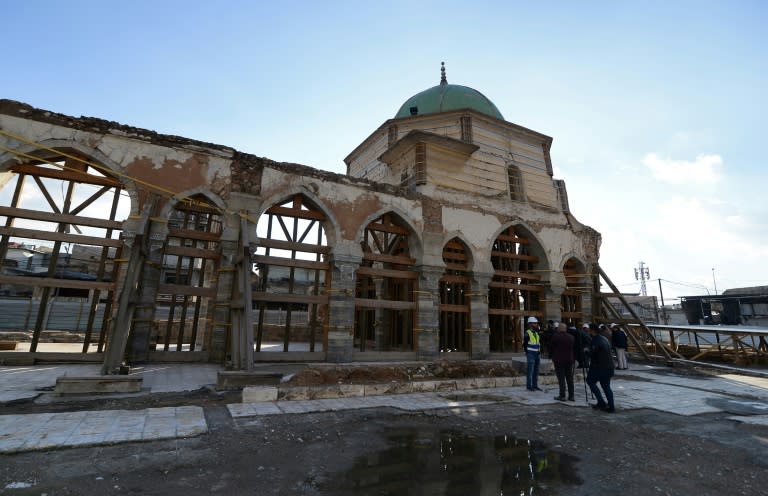 Des travaux de restauration en cours à la mosquée Al-Nouri, joyau du patrimoine d'Irak dans la vieille ville de Mossoul le 18 janvier 2022. (Zaid AL-OBEIDI)