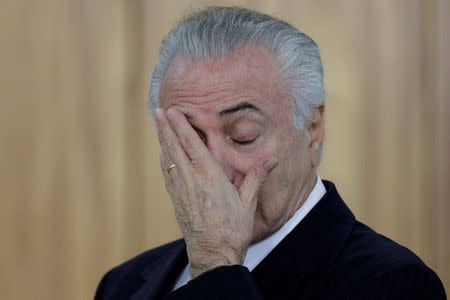 Brazilian President Michel Temer reacts during a credentials presentation ceremony for several new top diplomats at Planalto Palace in Brasilia, Brazil June 26, 2017. REUTERS/Ueslei Marcelino