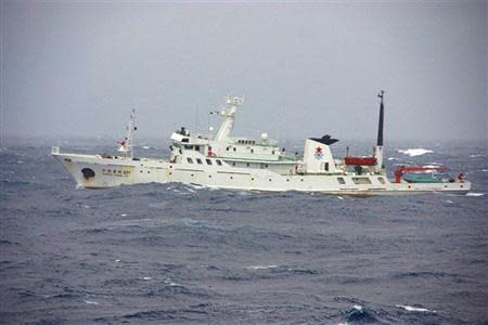 A Chinese patrol vessel is seen near the disputed islands in the East China Sea, known as the Senkaku isles in Japan or Diaoyu in China, in this January 27, 2011 file photo taken from a Japan Coast Guard vessel. Picture taken January 27, 2011. REUTERS/Japan Coast Guard/Handout/Files