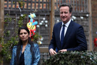 LONDON, ENGLAND - JUNE 01: Prime Minister David Cameron (R) walks with Employment Minister Priti Patel during a visit to a children's nursery on June 1, 2015 in London, England. The new Childcare Bill will see free early education or childcare allowances double for working parents with a household income of less than £150,000 - although it is not currently clear how many hours they will have to work in order to qualify. (Photo by Carl Court - WPA Pool / Getty Images)