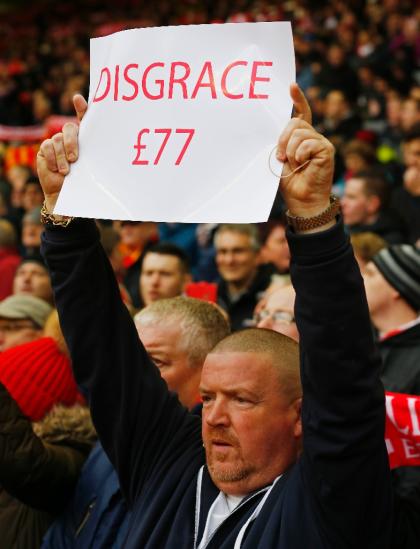 A Liverpool fan protests against the rise in ticket prices at Anfield. (AFP Photo)
