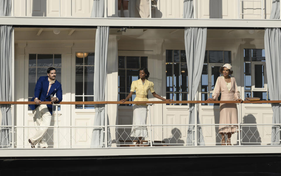 Ali Fazal as Andrew Katchadourian, Letitia Wright as Rosalie Otterbourne and Sophie Okonedo as Salome Otterbourne stand on the S.S Karnak, a real paddle steamer set built for the film. - Credit: Photo by Rob Youngson