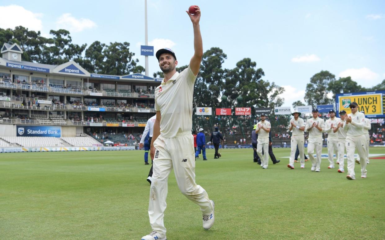 Mark Wood celebrates his five-wicket haul on Sunday - Getty Images Europe