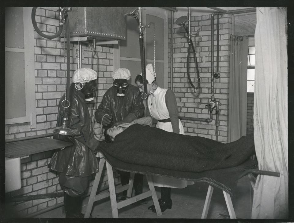 Nurses in protective clothing practising gas decontamination of a patient at Addenbrooke’s Hospital, Trumpington Street, Cambridge