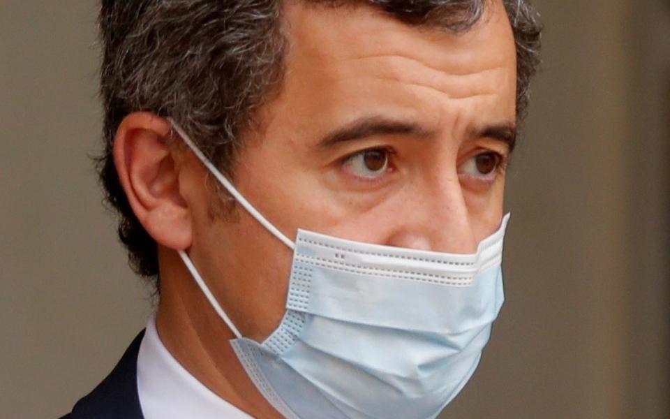 French Interior Minister Gerald Darmanin, wearing a protective face mask - CHARLES PLATIAU/ REUTERS