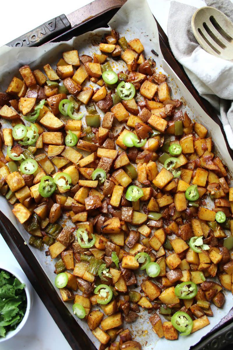 <p><a rel="nofollow noopener" href="https://www.womansday.com/food-recipes/g2645/potato-recipes/" target="_blank" data-ylk="slk:Breakfast potatoes;elm:context_link;itc:0;sec:content-canvas" class="link ">Breakfast potatoes</a> for the win - <em>always</em>. These just so happen to be made crispy through baking, not frying.</p><p><strong>Get the recipe at <a rel="nofollow noopener" href="https://www.thissavoryvegan.com/sheet-pan-breakfast-potatoes/" target="_blank" data-ylk="slk:The Savory Vegan;elm:context_link;itc:0;sec:content-canvas" class="link ">The Savory Vegan</a>.</strong></p>