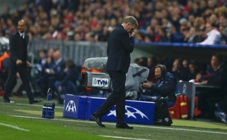 Manchester United's manager David Moyes reacts after their Champions League quarter-final second leg soccer match against Bayern Munich in Munich, April 9, 2014. REUTERS/Michael Dalder (GERMANY - Tags: SPORT SOCCER)