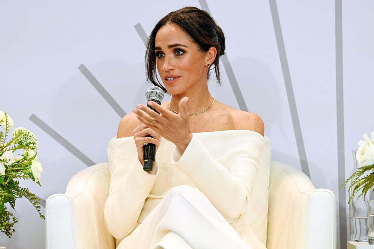 <p>Bryan Bedder/Getty</p> Meghan Markle speaks onstage at The Archewell Foundation Parents