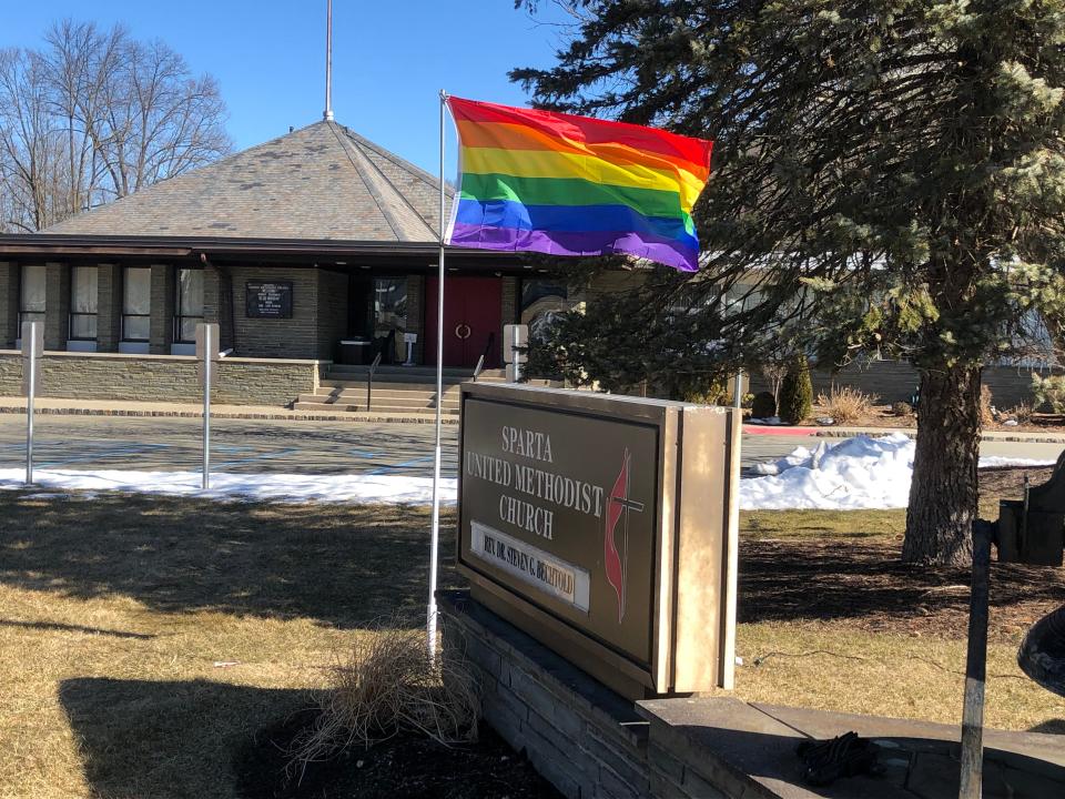 An LGBTQ+ flag flies in front of the Sparta United Methodist Church after an identical one was burned on April 20. That incident marked the second flag burning at the church this year.