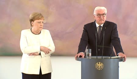 German Chancellor Angela Merkel was seen shaking as she met President Frank-Walter Steinmeier in Berlin