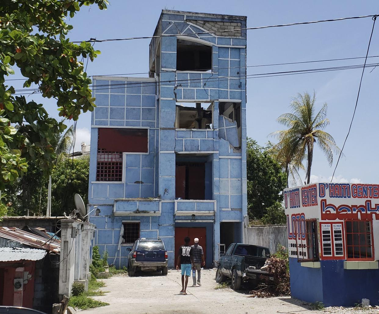 The CaSud restaurant and hotel is damaged after a 7.2 magnitude earthquake struck in Les Cayes, Haiti, Saturday, Aug. 14, 2021. According to a family member of the owner, the owner and the owner's mother are trapped inside.