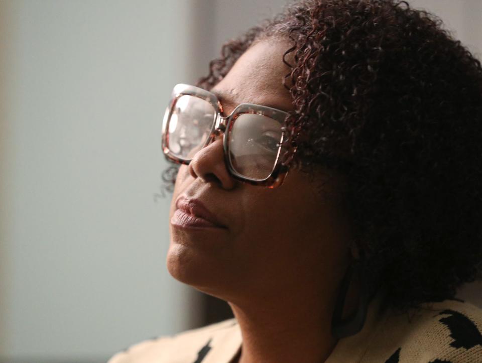 Teresa Stafford, CEO of Hope and Healing Survivor Resource Center, home of the Battered Woman's Shelter, discusses the new strangulation law and the importance of the law in her office in Akron.