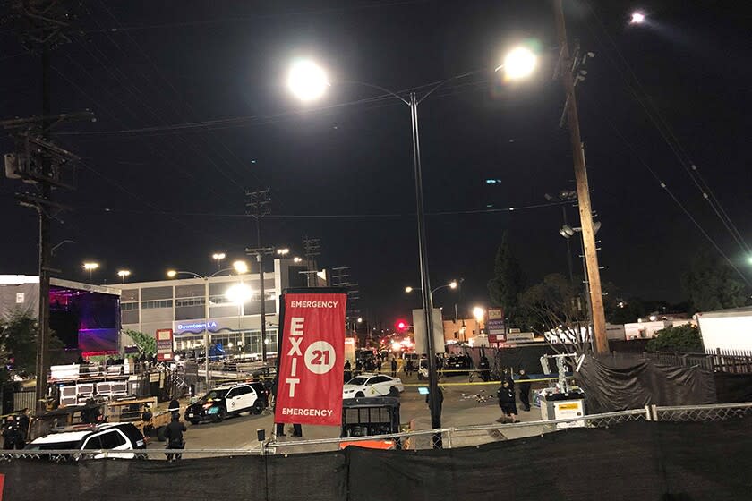 Police outside the backstage area at the Banc of California Stadium