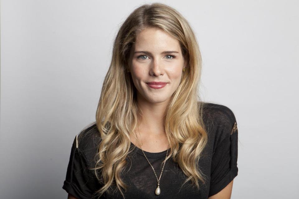 This Aug. 22, 2013 photo shows Canadian actress Emily Bett Rickards from The CW series "Arrow," in New York, premiering its new season on Oct. 9 at 8 p.m. EST. (Photo by Amy Sussman/Invision/AP)