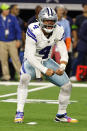 Dallas Cowboys quarterback Dak Prescott (4) celebrates after throwing a touchdown pass to Jake Ferguson, not pictured, in the second half of an NFL football game against the Seattle Seahawks in Arlington, Texas, Thursday, Nov. 30, 2023. (AP Photo/Roger Steinman)