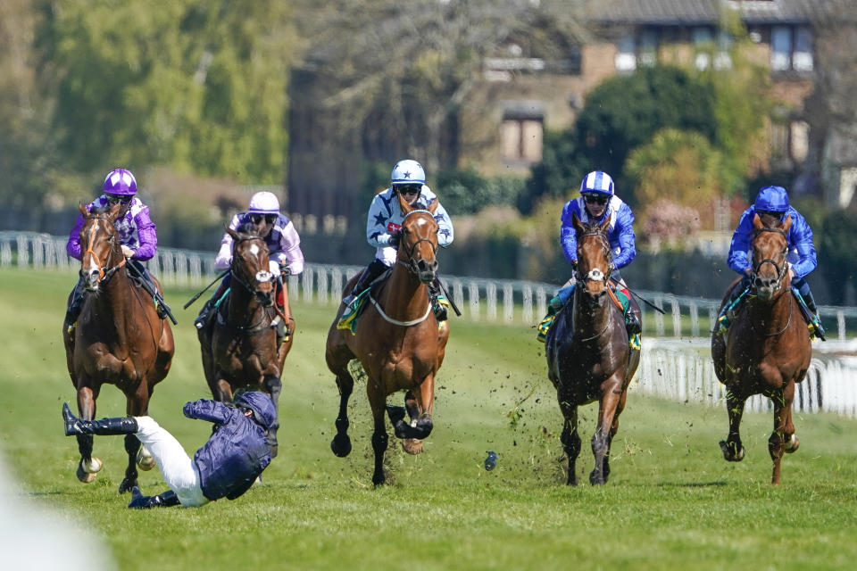 <p>ESHER, ENGLAND - APRIL 23: Ryan Moore falls from Rifleman after it veers when making its challenge inside the final furlong during The bet365 Esher Cup Handicap at Sandown Park Racecourse on April 23, 2021 in Esher, England. Sporting venues around the UK remain under restrictions due to the Coronavirus Pandemic. Only owners are allowed to attend the meeting but the public must wait until further restrictions are lifted. (Photo by Alan Crowhurst/Getty Images)</p>
