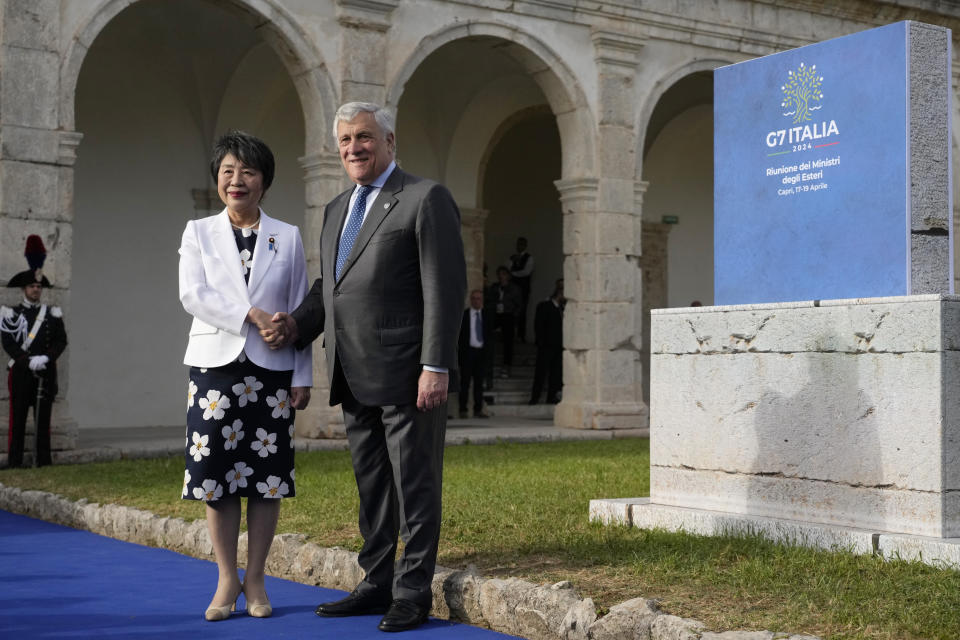 Italian Foreign Minister Antonio Tajani, right, welcomes Japanese Foreign Minister Yoko Kamikawa at the G7 Foreign Ministers meeting, on the Island of Capri, Italy, Wednesday, April 17, 2024. Group of Seven foreign ministers are meeting on the Italian resort island of Capri, with soaring tensions in the Mideast and Russia's continuing war in Ukraine topping the agenda. The meeting runs April 17-19. (AP Photo/Gregorio Borgia)