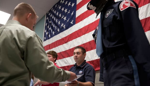 Grand Rapids, Michigan - Military veterans look for work at a job fair at the Army Reserve Center.