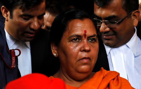 India's Water Resources minister Uma Bharti, one of the accused who is charged over the 1992 Babri mosque demolition case, leaves after appearing in a court in Lucknow, India, May 30, 2017. REUTERS/Pawan Kumar