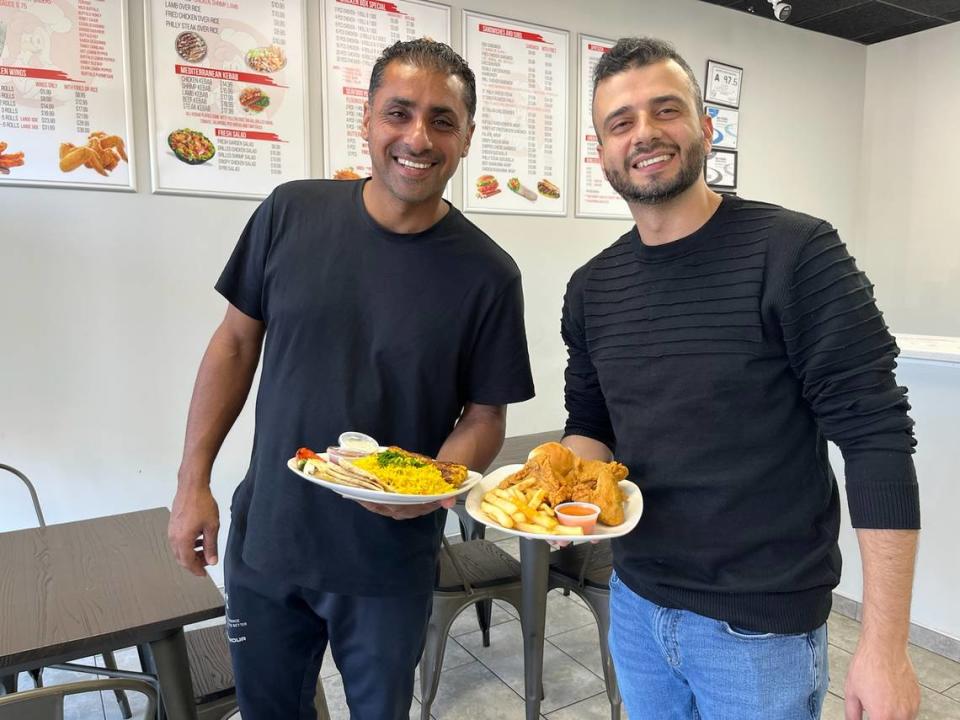 US Fried Chicken co-owners Mohammad Alamreen (left) and Mohammad Alweesi. Heidi Finley/CharlotteFive