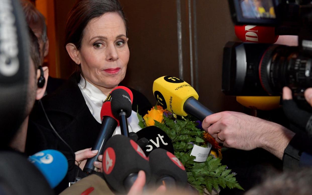 Sara Danius talks to the media as she leaves after a meeting at the Swedish Academy in Stockholm - REUTERS