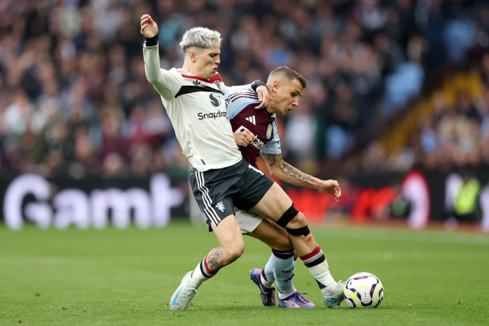 Alejandro Garnacho is challenged by Lucas Digne (Getty)