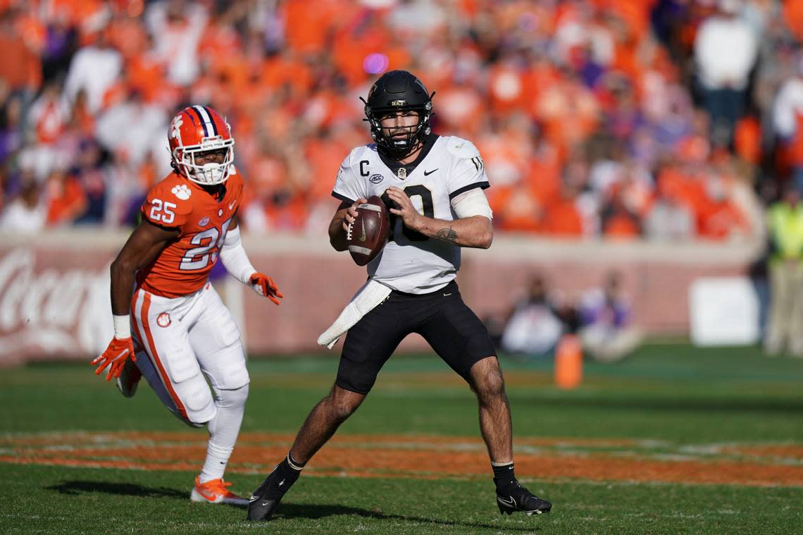 Wake Forest quarterback Sam Hartman (10) sets up to pass the ball against Clemson safety Jalyn Phillips (25) during the second half of an NCAA college football game, Saturday, Nov. 20, 2021, in Clemson, S.C.