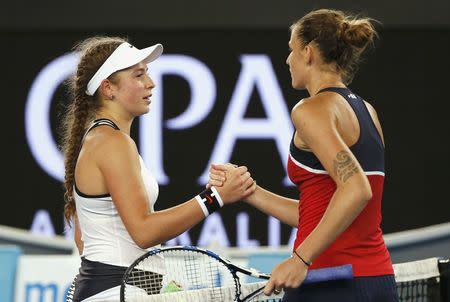 Tennis - Australian Open - Melbourne Park, Melbourne, Australia - 21/1/17 Czech Republic's Karolina Pliskova shakes hands after winning her Women's singles third round match against Latvia's Jelena Ostapenko.REUTERS/Issei Kato