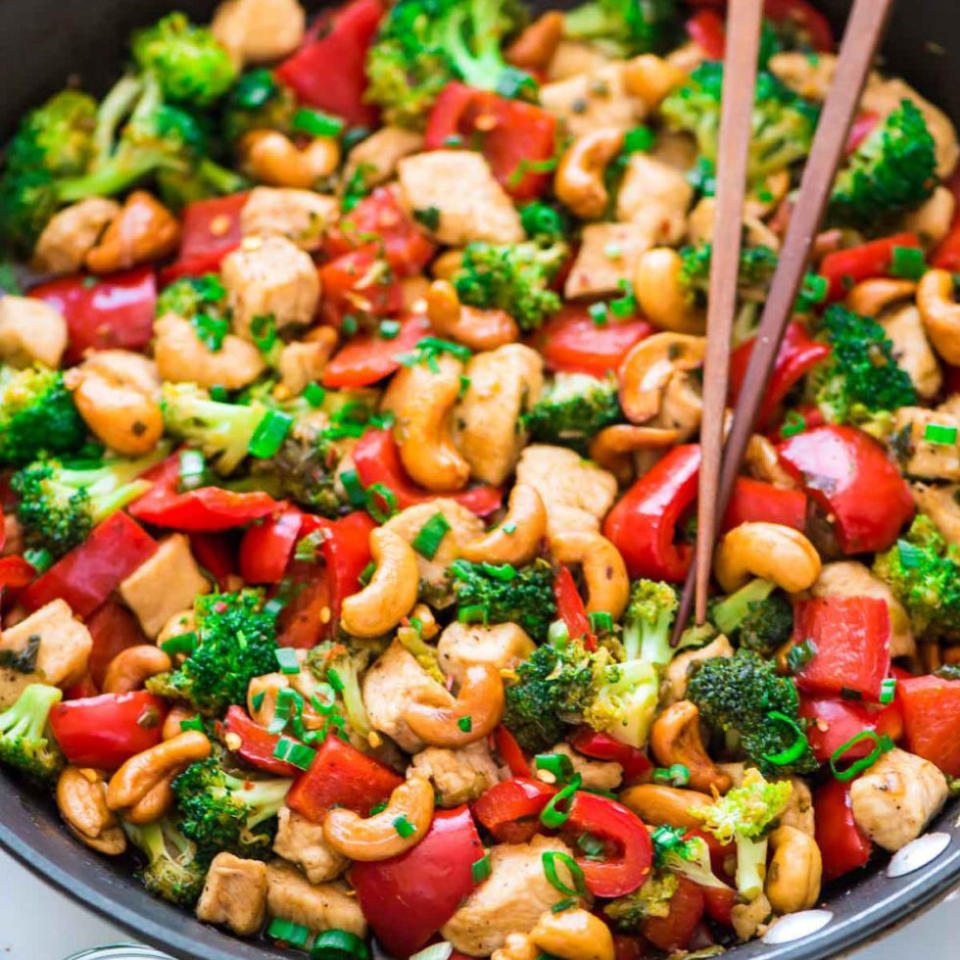 <p>This Asian stir-fry dish packed with veggies can be whipped up in a breeze on a <a rel="nofollow noopener" href="http://www.redbookmag.com/food-recipes/g3826/ina-garten-dinner-recipes/" target="_blank" data-ylk="slk:busy weekday night;elm:context_link;itc:0;sec:content-canvas" class="link ">busy weekday night</a>.</p><p><strong>Get the recipe at <a rel="nofollow noopener" href="http://www.wellplated.com/thai-cashew-chicken/" target="_blank" data-ylk="slk:Well Plated By Erin;elm:context_link;itc:0;sec:content-canvas" class="link ">Well Plated By Erin</a>.</strong></p><p><strong>RELATED: </strong><strong><a rel="nofollow noopener" href="http://www.redbookmag.com/life/a48518/rare-goth-chicken-craze/" target="_blank" data-ylk="slk:This Rare "Goth" Chicken Is the Newest Craze In the Poultry World;elm:context_link;itc:0;sec:content-canvas" class="link ">This Rare "Goth" Chicken Is the Newest Craze In the Poultry World</a></strong></p>