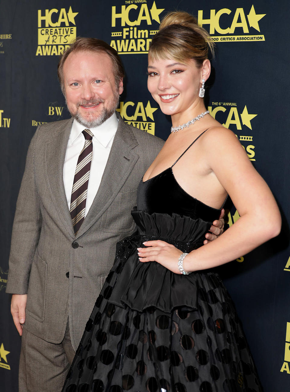 (L-R) Rian Johnson and Madelyn Cline attend the Hollywood Critics Association's 2023 HCA Film Awards at Beverly Wilshire, A Four Seasons Hotel on February 24, 2023 in Beverly Hills, California.