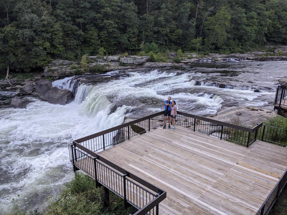 Dennis Romboy, left, and Jill Romboy take a selfie next to the falls on the Youghiogheny River in Ohiopyle State Park. | Marcus Romboy, for the Deseret News
