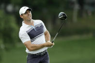 Rory McIlroy, of Northern Ireland, watches his tee shot on the 18th hole during the second round of the Travelers Championship golf tournament at TPC River Highlands, Friday, June 26, 2020, in Cromwell, Conn. (AP Photo/Frank Franklin II)