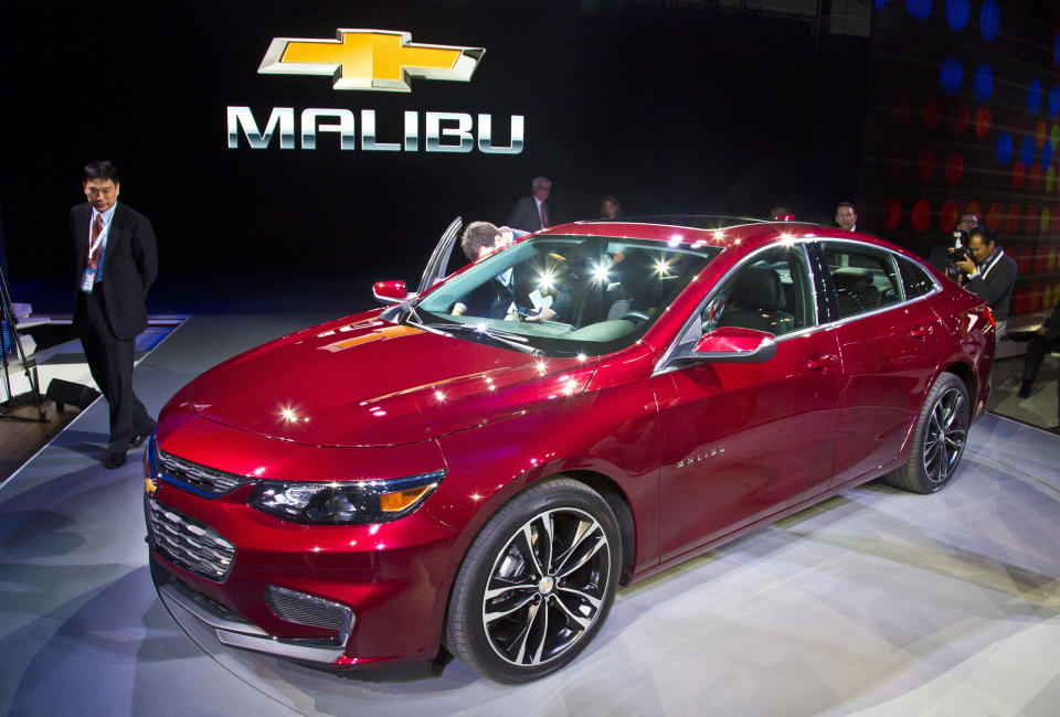 FILE - The 2016 Chevrolet Malibu Hybrid is introduced at the New York International Auto Show, April 1, 2015. The Malibu, the last midsize car made by a Detroit automaker, is heading for the junkyard. General Motors confirmed Thursday, May 9, 2024, that it will stop making the car introduced in 1964 as the company focuses more on electric vehicles. (AP Photo/Bebeto Matthews, File)