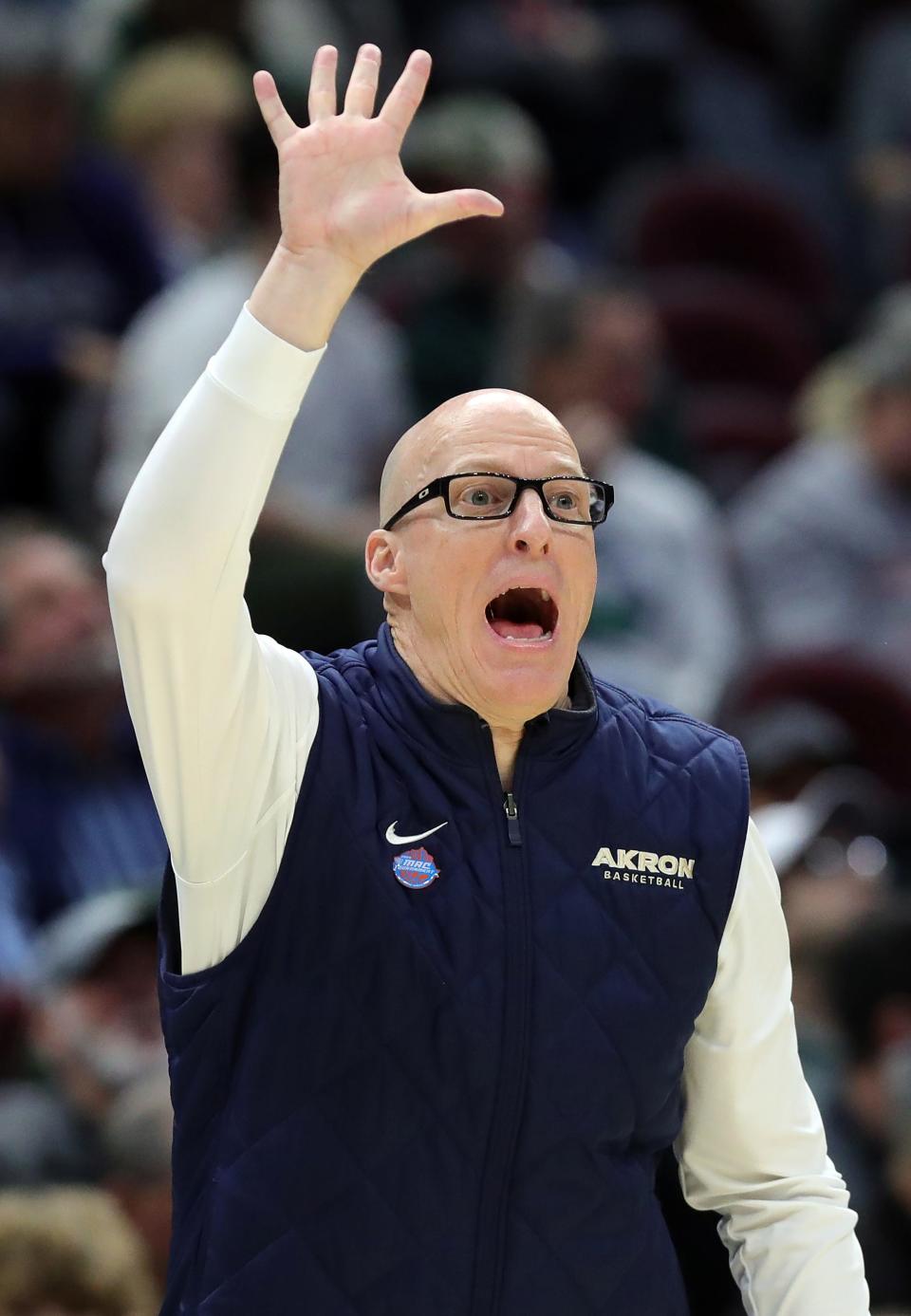 Akron coach John Groce works the sideline in the quarterfinals of the Mid-American Conference Tournament on Thursday in Cleveland.