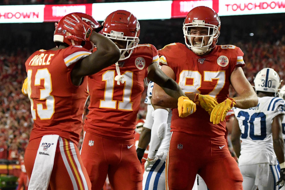 Kansas City Chiefs wide receiver Byron Pringle (13) celebrates his touchdown against the Indianapolis Colts with wide receiver Demarcus Robinson (11) and tight end Travis Kelce (87) during the first half of an NFL football game in Kansas City, Mo., Sunday, Oct. 6, 2019. (AP Photo/Ed Zurga)