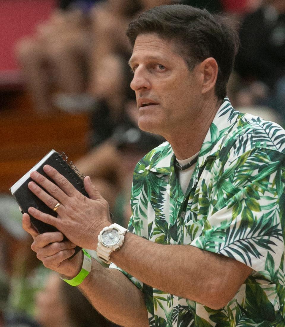 Venice High School Head Coach Brian Wheatley instructs his players against Hagerty High School during their FHSAA Class 7A State Championship volleyball match at Polk State College in Winter Haven Saturday night. November 12, 2022