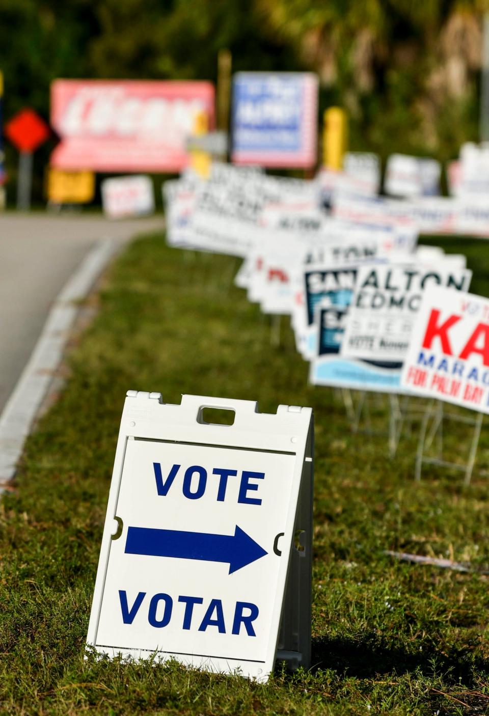 Campaign signs line the road leading to Max K. Rodes Park in West Melbourne, FL Tuesday, Nov. 3, 2020. Mandatory Credit: Craig Bailey/FLORIDA TODAY via USA TODAY NETWORK