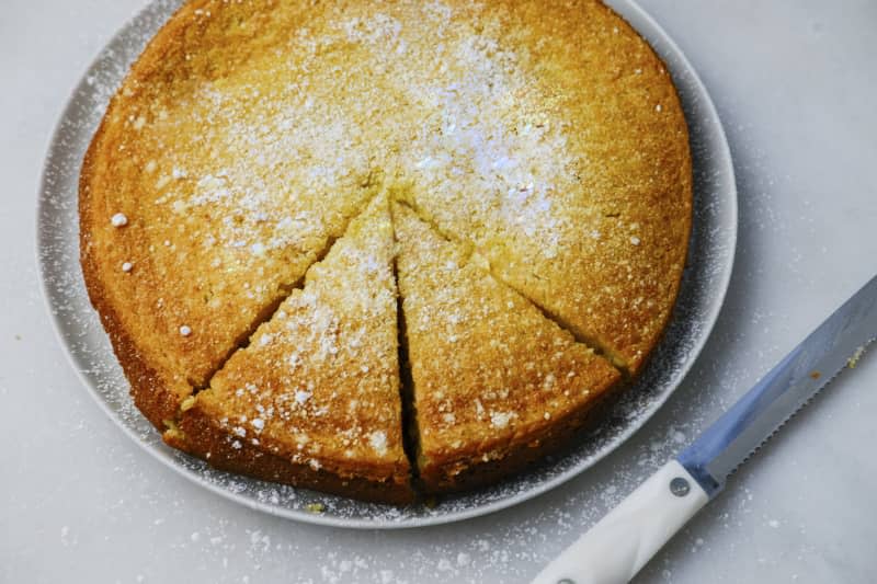 Lemon cake sliced into two peices.