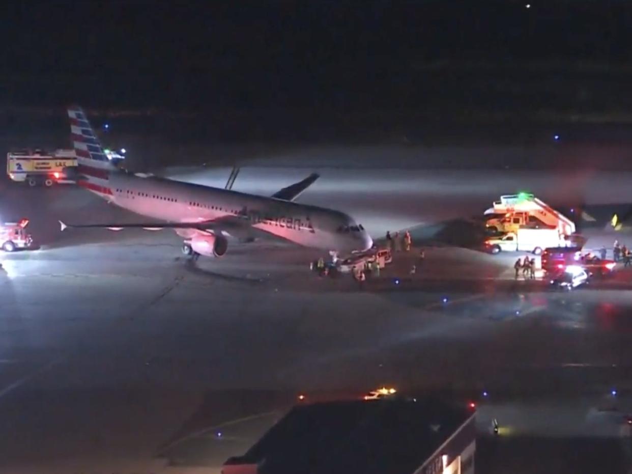 American Airlines plane on LAX tarmac with first responders