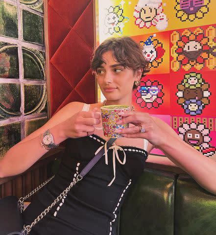 <p>Taylor Hill/Instagram</p> Taylor Hill shows off her short new hairdo as she poses in Japan